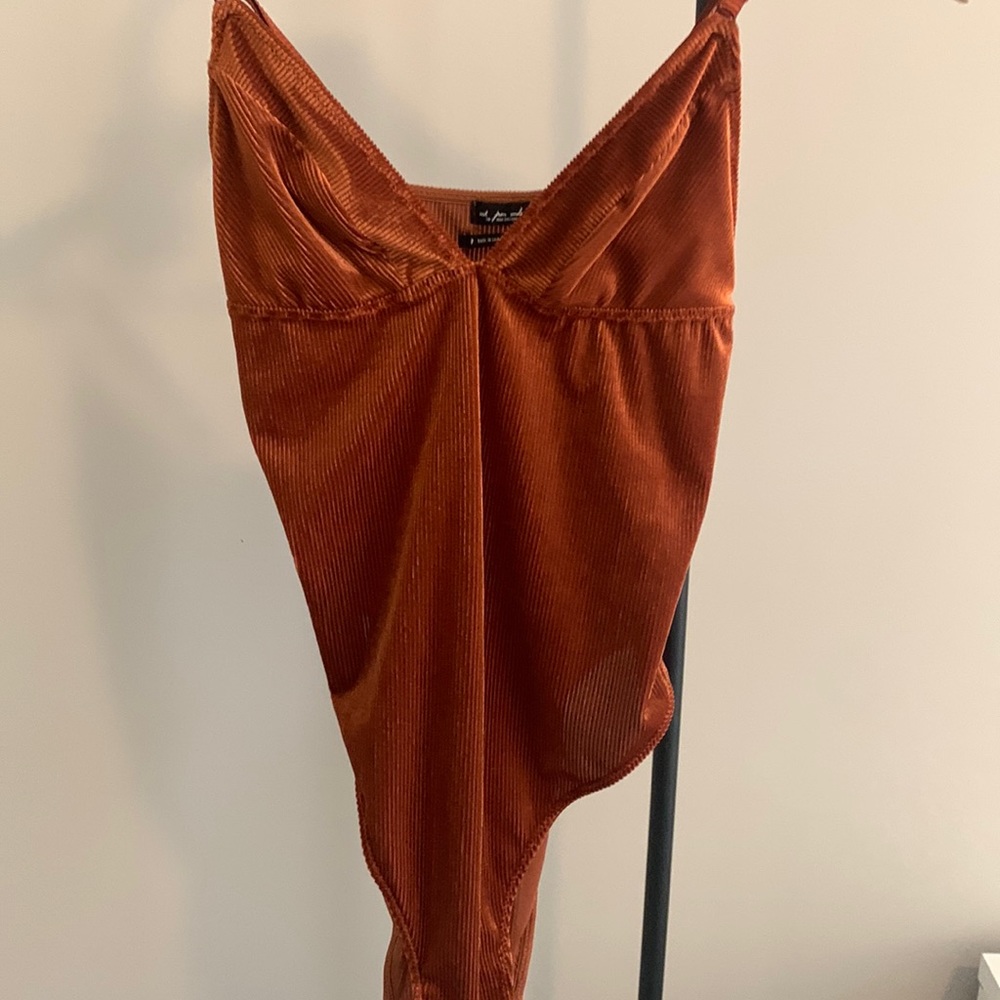 Urban Outfitters orange velvet body suit